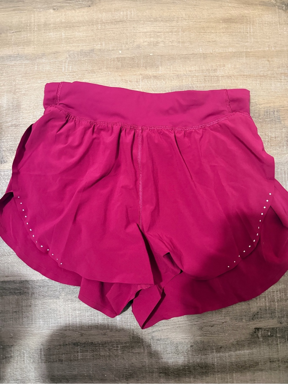 Lululemon women’s magenta shorts, size 4